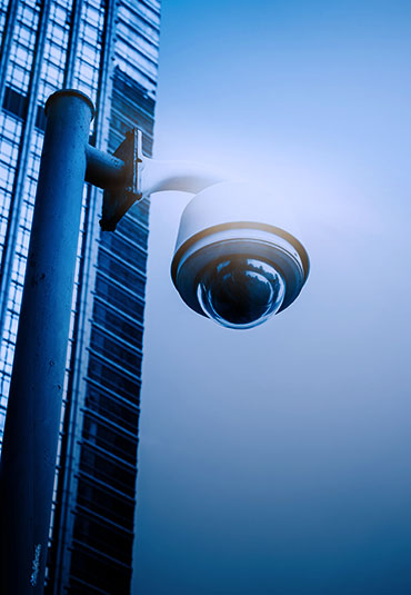 CCTV camera mounted on building exterior